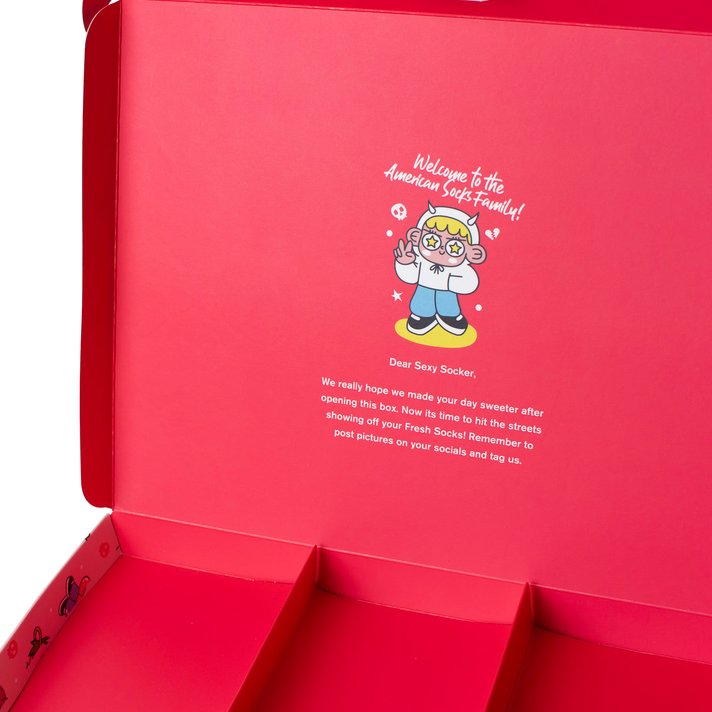 Close up of empty interior of pink giftbox with thank you message by american socks