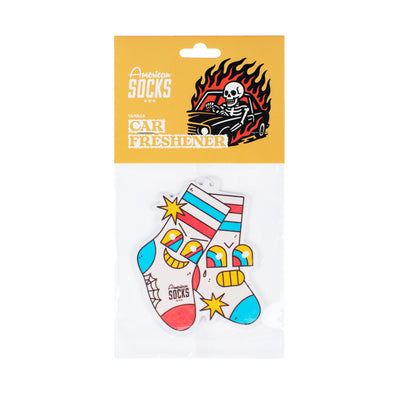 Packaged car freshener with socks and skull design on a yellow background